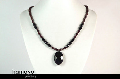 CAPRICORN CHARM NECKLACE - Faceted Black Onyx Pendant and Red Garnet Beads